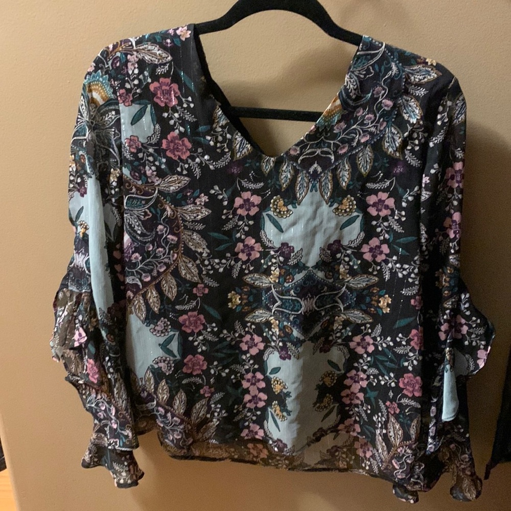 Floral womens blouse with ruffle sleeves and bow in back